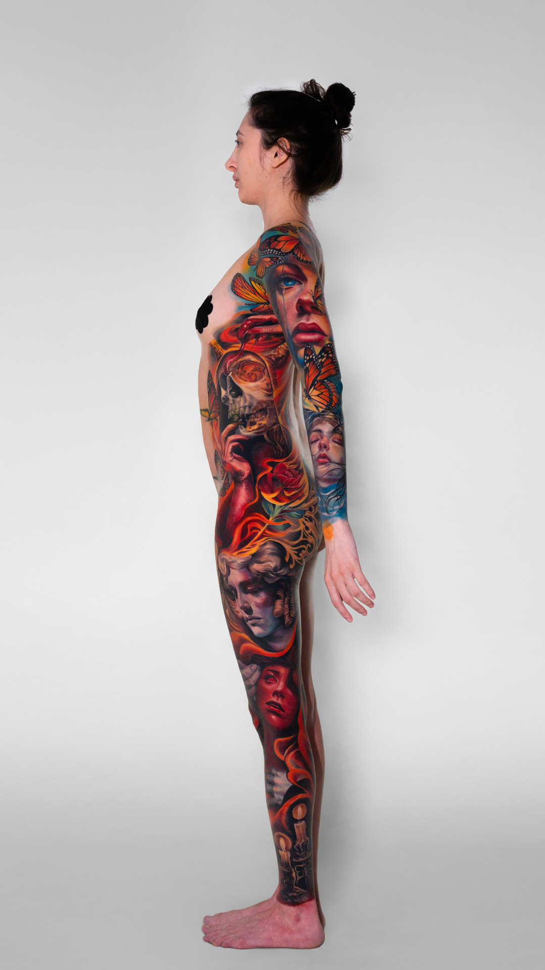 Color realism composition covering the entire left side from ankle through torso and arm by Tony Vilella